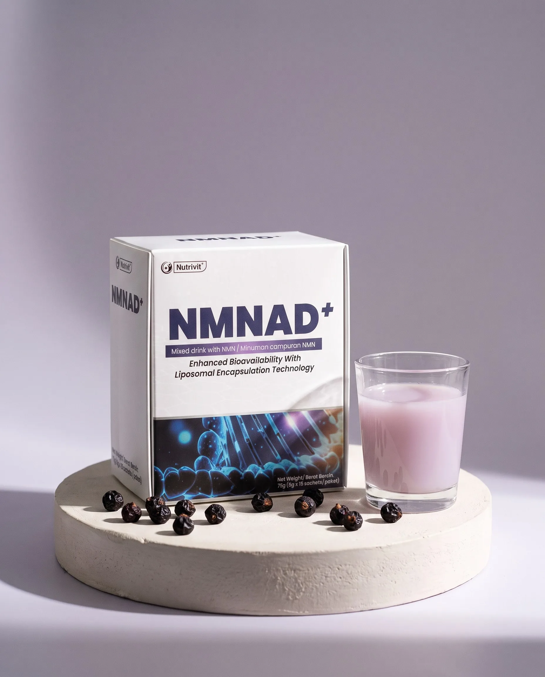 NMNAD+ box on a plaster plinth beside a glass of lilac drink